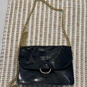 Jimmy Choo Glossy Black Crossbody Bag with Gold Chain